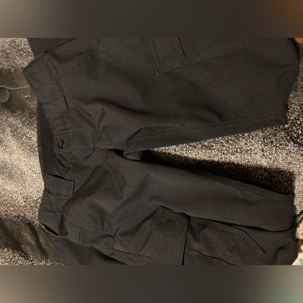 Under Armour black work pants.